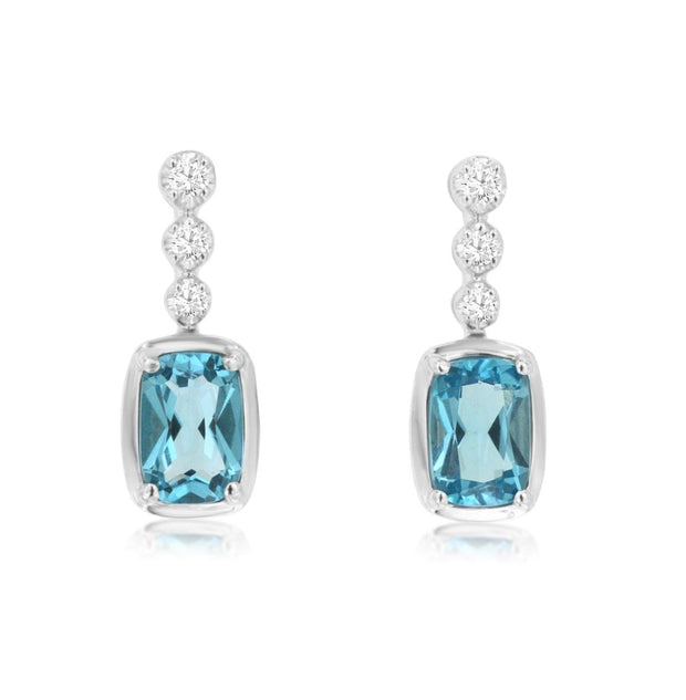 14k white gold blue topaz and  diamond earring