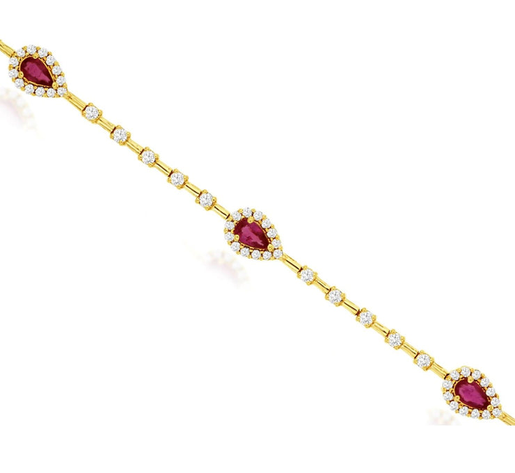 14k yellow gold pear shaped rubies and diamond station bracelet